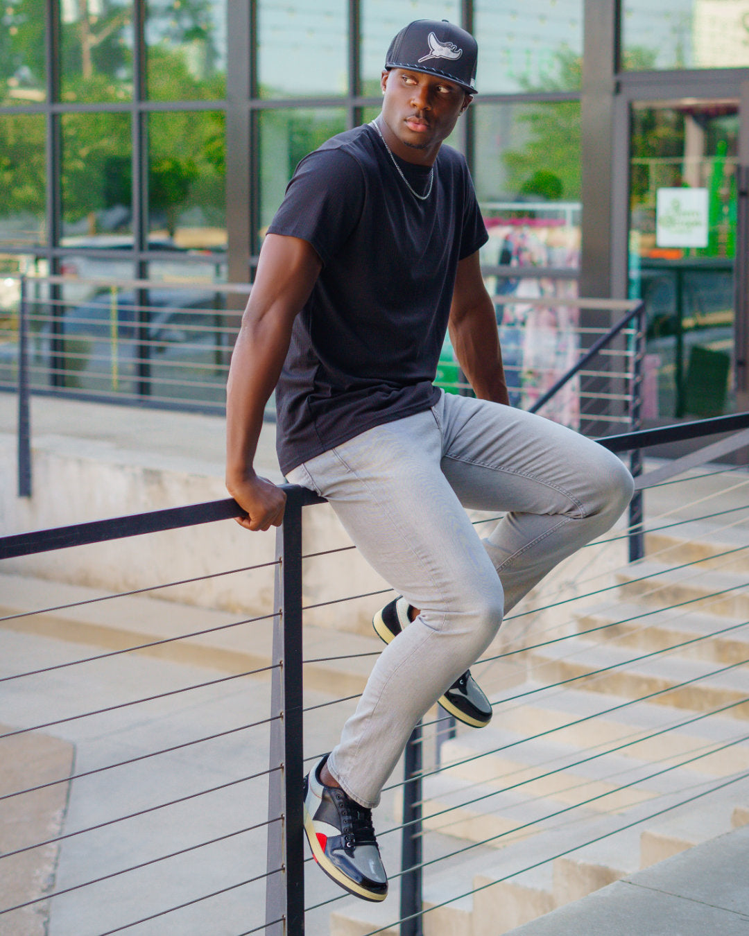 man wearing Collection Plate Love & Hip Hop Sneaker
